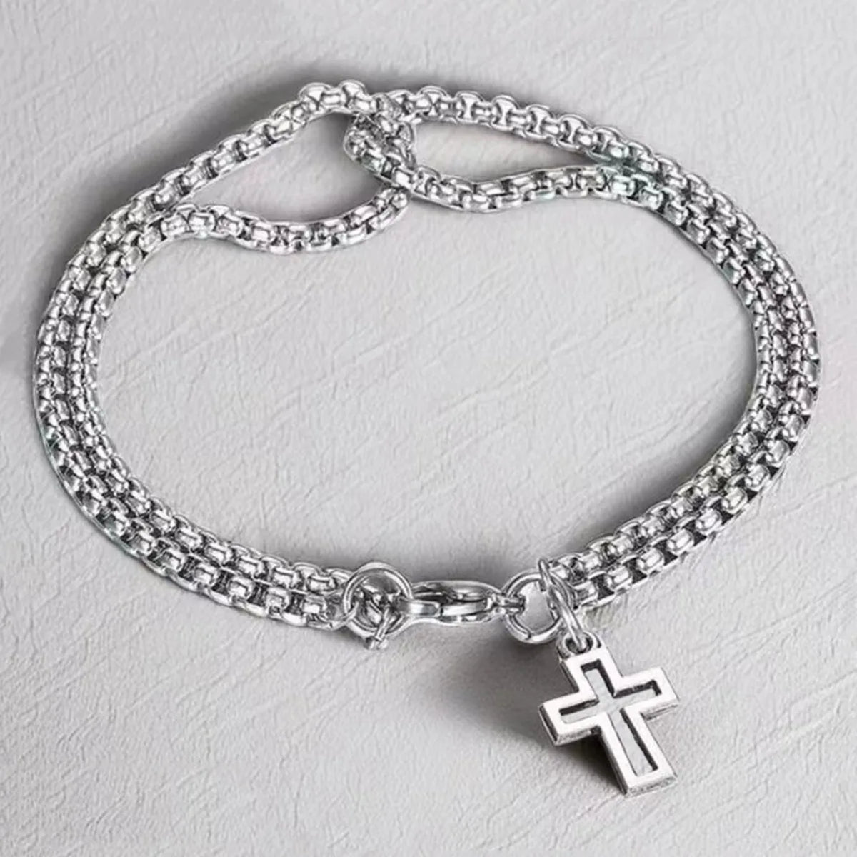 Pulsera inoxidable doble y cruz calada